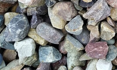 Abstract background with lot of various shape peeble stones. 