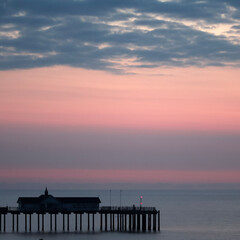 north sea sunrise at southwold pier in england