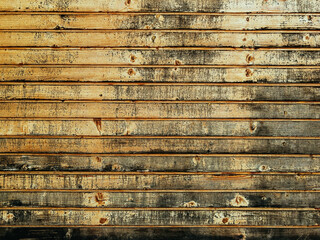 Worn wooden slatted wall surface as background