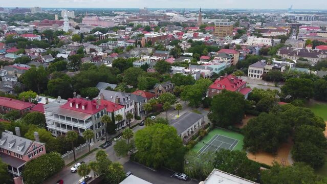 An orbiting drone shot of Rainbow Row in Charleston, SC.