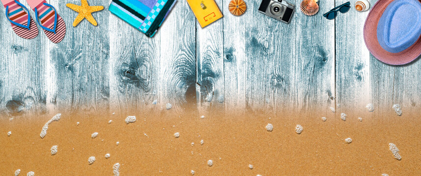Topview Beach Accessories Background on Sand and Blue Wood - Powered by Adobe