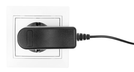 Power European electric plug isolated on a white. black electric cord plugged into a white...