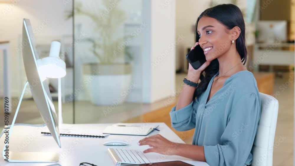 Aufkleber woman answering a phone call in an office alone at work. one young and happy indian corporate worker