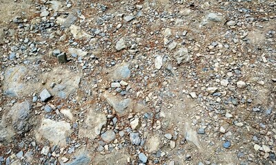 Abstract background with lot of various shape peeble stones. 
