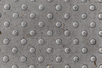 Melie stones in a dense ornament close-up in daylight.