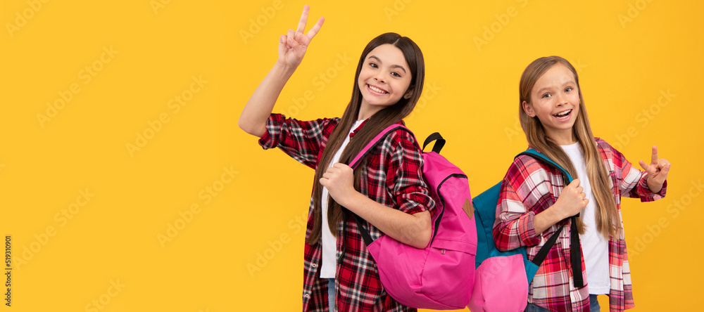 Sticker school girls friends. knowledge day. concept of education. kids with long hair on yellow background.