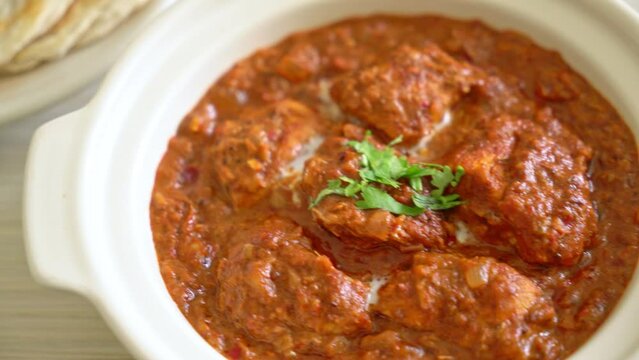 chicken tikka masala spicy curry meat food with roti or naan bread - Indian food style
