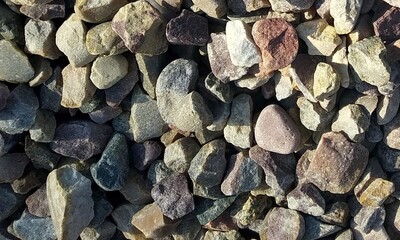 Abstract background with lot of various shape peeble stones. 