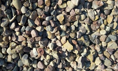 Abstract background with lot of various shape peeble stones. 