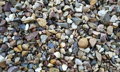 Abstract background with lot of various shape peeble stones. 