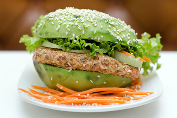 Vegan burger with avocado and greens