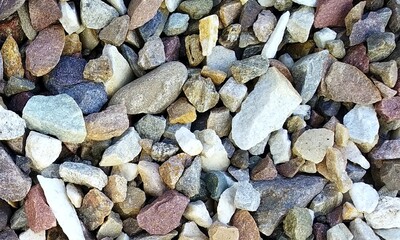 Abstract background with lot of various shape peeble stones. 