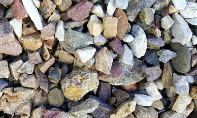 Abstract background with lot of various shape peeble stones. 