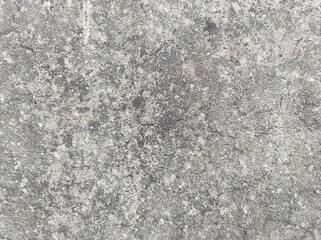 Wall fragment with scratches and cracks.vintage dirty exfoliating plaster Textured background peeling of colour wallpaper cement.The​ pattern​ of​ surface​ wall​ concrete​ for​ background.