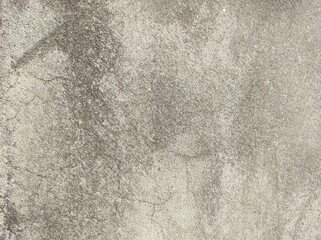 Wall fragment with scratches and cracks.vintage dirty exfoliating plaster Textured background peeling of colour wallpaper cement.The​ pattern​ of​ surface​ wall​ concrete​ for​ background.