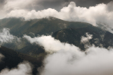 Naklejka na ściany i meble Clouds over Velka Fatra mountains, Slovakia