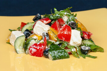 Healthy organic Greek salad with fresh vegetables