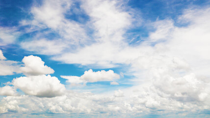 Clean blue sky and white clouds sky background with space for decoration. And used to make wallpaper or bring to work in graphic design.