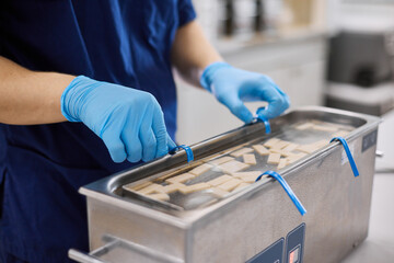 Scientists work in the laboratory. A researcher conducts laboratory research