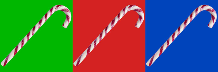 Christmas candy candy cane close-up isolated on colorful background