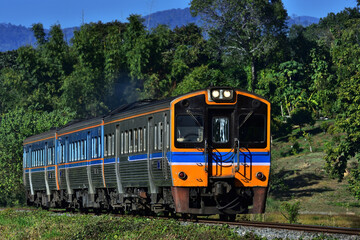 Diesel railcar on the railway in Thailand