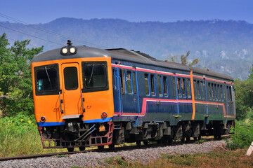 Fototapeta premium Diesel railcar on the railway in Thailand