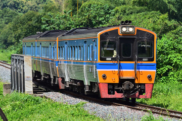 Obraz premium Diesel railcar on the railway in Thailand
