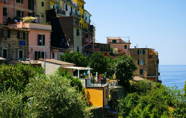 Travel to Cinque Terre (Five Lands in English). Aerial view over Corniglia architecture landmark village at the coast of Liguria Sea from Italy. 