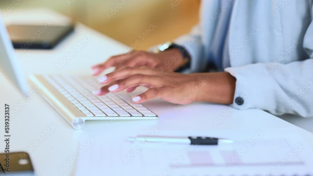 Poster A businesswomans hands typing on a keyboard while sitting at a desk and sending an email in an office. Financial advisor doing online research for a budget plan and communicating with clients