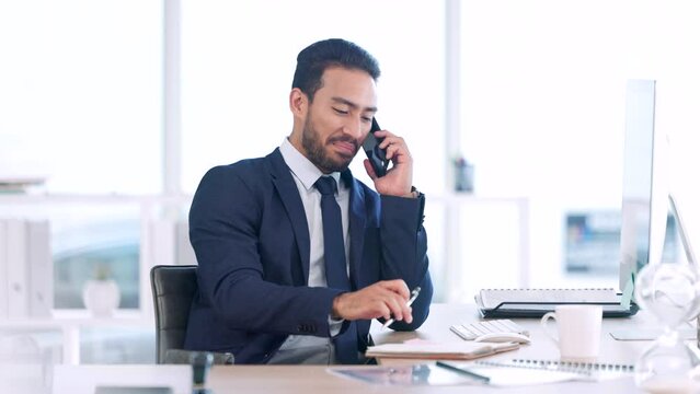 A business man planning a meeting in his schedule with a client on the phone. Male executive worker having funny conversation and making notes of information. Networking with clients via a call