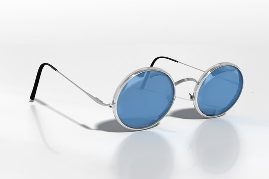 3d runde modische Brillle mit blauen Gläsern und verchromten Brillengestell, isoliert