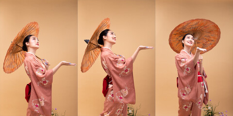 Young 20s Asian Japanese woman wear traditional Kimono, hold painting umbrella and hand for rain