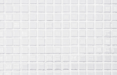 White or gray ceramic wall tiles background. Design geometric mosaic texture.