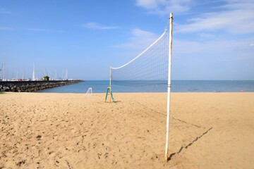 Beautiful tropical sea beach with  volleyball net in summer time.