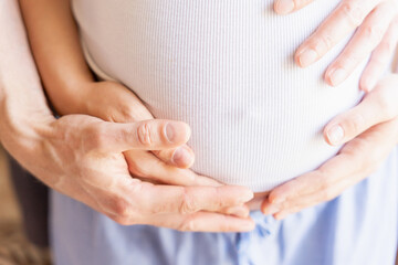 Pregnant hands woman belly. Happy pregnancy woman and husband hugging pregnant belly. Concept maternity, pregnancy, childbirth.