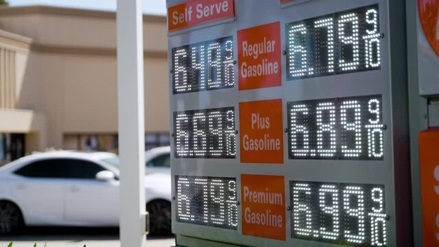 High Gas Prices on a Gas Station Sign in California, Close Up. $6.49 for Regular.