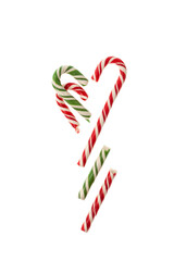 Broken Christmas Candy canes on white background. Traditional Christmas sweets