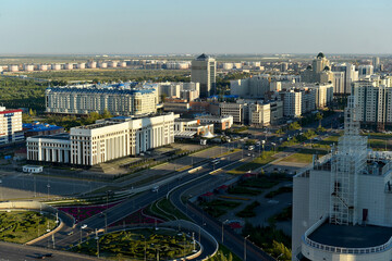 Top view of cityscape of Astana, the capital of Kazakhstan, with modern skyscrapers and park.