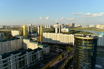 Fototapeta premium Top view of cityscape of Astana, the capital of Kazakhstan, with modern skyscrapers,park and the presidential palace, Ak Orda in background.