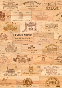 Wood cases with logos of best wines of Bordeaux, Margaux, Pauillac, Saint Estephe, Pomerol, Saint Emilion, Sauternes, Petrus, Latour