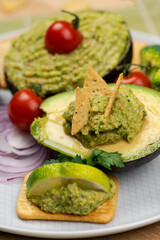 Broccoli Guacamole dip. Broccomole sauce. Stuffed avocado