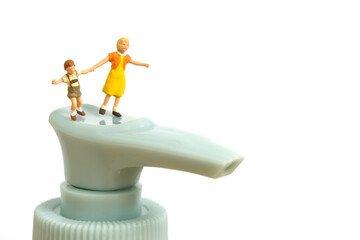 Miniature people toy figure photography. Health protocol on pandemic concept. A group of kids...