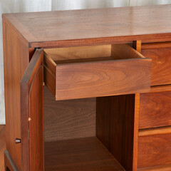 Original 1964 mid-century modern credenza. Walnut sideboard buffet with cane weave details. Vintage 1960s style. Open drawer detail view.