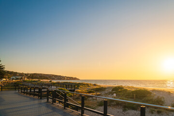 New esplanade as part of from Glenelg to Seacliff coastal walk at sunset, South Australia