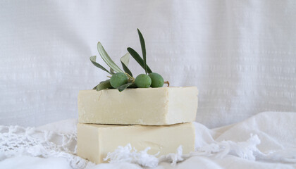 Natural Olive oil soap. Organic handmade soap bars with olive branch concept. Skin care products. Selective focus.