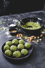 Ingredients to make falafel. Grounded chick peas.  Green healthy food. Vegan delicious dish. Vegetarian meal. Food preparation. Arabic dish.