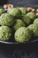 Fototapeta premium Ingredients to make falafel. Grounded chick peas. Green healthy food. Vegan delicious dish. Vegetarian meal. Food preparation. Arabic dish.