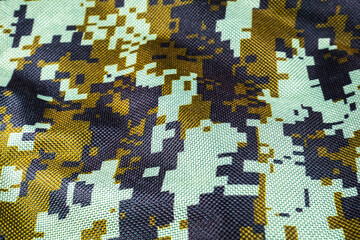 Dark green Camouflage khaki texture with pixels background. Army and military concept.