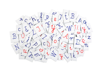 Pile of letters from a notebook on white background. Typography background composition.