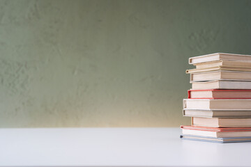 Stack of mini old books.